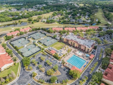 One or more photo(s) has been virtually staged. This one will on Carrollwood Country Club in Florida - for sale on GolfHomes.com, golf home, golf lot