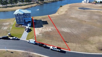 Generous lot directly overlooking the fountain at Crystal Lake on Bay Creek Golf Club in Virginia - for sale on GolfHomes.com, golf home, golf lot