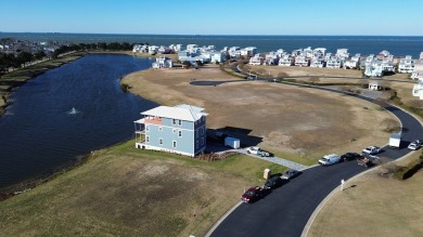 Generous lot directly overlooking the fountain at Crystal Lake on Bay Creek Golf Club in Virginia - for sale on GolfHomes.com, golf home, golf lot