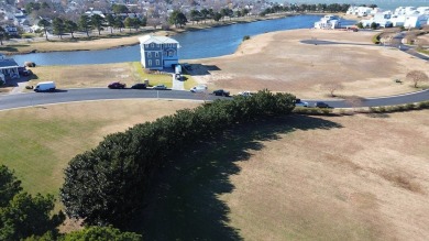 Generous lot directly overlooking the fountain at Crystal Lake on Bay Creek Golf Club in Virginia - for sale on GolfHomes.com, golf home, golf lot