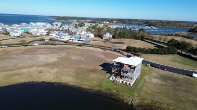 Generous lot directly overlooking the fountain at Crystal Lake on Bay Creek Golf Club in Virginia - for sale on GolfHomes.com, golf home, golf lot