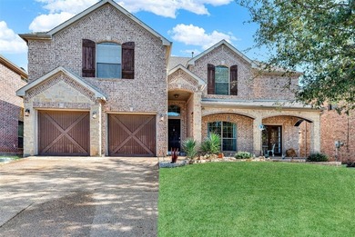Tucked inside a gated, resort-style community, this home offers on The Golf Club at Resort Eagle Mountain Lake in Texas - for sale on GolfHomes.com, golf home, golf lot
