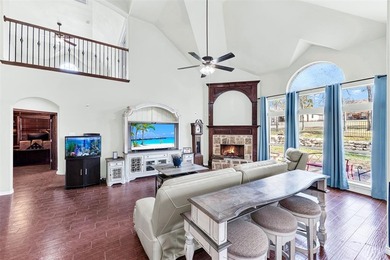 Tucked inside a gated, resort-style community, this home offers on The Golf Club at Resort Eagle Mountain Lake in Texas - for sale on GolfHomes.com, golf home, golf lot