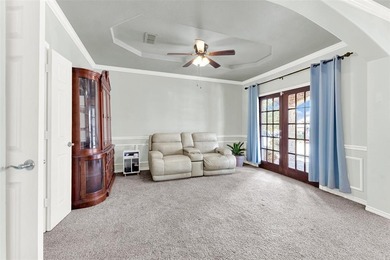 Tucked inside a gated, resort-style community, this home offers on The Golf Club at Resort Eagle Mountain Lake in Texas - for sale on GolfHomes.com, golf home, golf lot