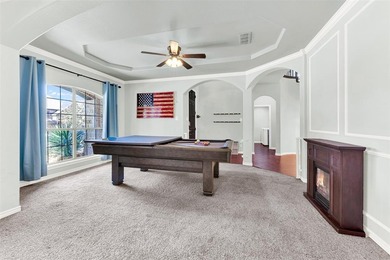 Tucked inside a gated, resort-style community, this home offers on The Golf Club at Resort Eagle Mountain Lake in Texas - for sale on GolfHomes.com, golf home, golf lot