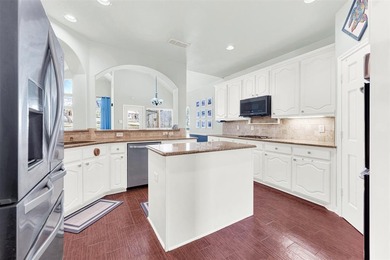 Tucked inside a gated, resort-style community, this home offers on The Golf Club at Resort Eagle Mountain Lake in Texas - for sale on GolfHomes.com, golf home, golf lot