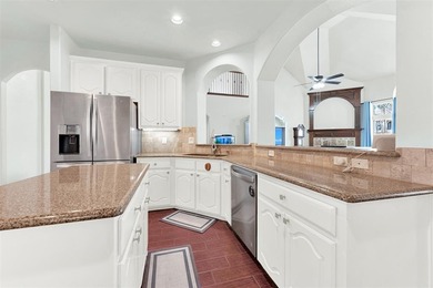 Tucked inside a gated, resort-style community, this home offers on The Golf Club at Resort Eagle Mountain Lake in Texas - for sale on GolfHomes.com, golf home, golf lot