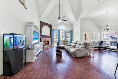 Tucked inside a gated, resort-style community, this home offers on The Golf Club at Resort Eagle Mountain Lake in Texas - for sale on GolfHomes.com, golf home, golf lot