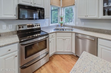 Nestled in the sought-after Tanasi Coves neighborhood of Tellico on Tanasi Golf Course in Tennessee - for sale on GolfHomes.com, golf home, golf lot
