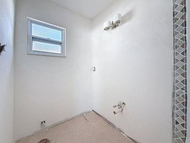 Perfect for Investors or for you who wants to make this property on Mangrove Bay Golf Course in Florida - for sale on GolfHomes.com, golf home, golf lot