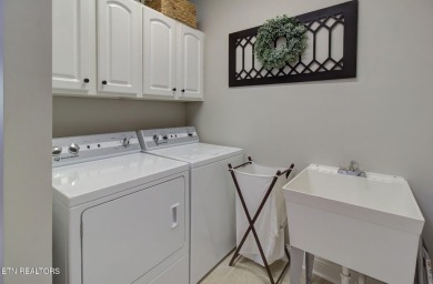 Nestled in the sought-after Tanasi Coves neighborhood of Tellico on Tanasi Golf Course in Tennessee - for sale on GolfHomes.com, golf home, golf lot