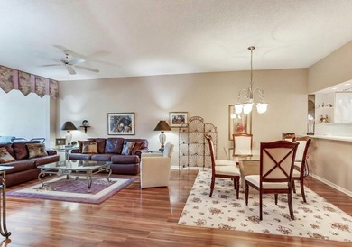 Must See This Stunning single-story end unit featuring 2 on Tara Golf and Country Club in Florida - for sale on GolfHomes.com, golf home, golf lot