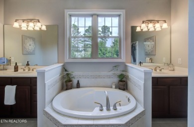 Nestled in the sought-after Tanasi Coves neighborhood of Tellico on Tanasi Golf Course in Tennessee - for sale on GolfHomes.com, golf home, golf lot