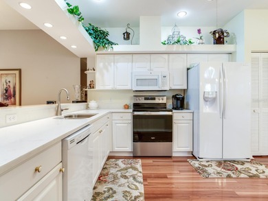 Must See This Stunning single-story end unit featuring 2 on Tara Golf and Country Club in Florida - for sale on GolfHomes.com, golf home, golf lot