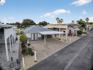 Welcome home to this beautifully maintained 2020 residence in on Deer Creek RV Golf Resort in Florida - for sale on GolfHomes.com, golf home, golf lot