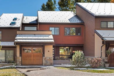 This expansive four-bedroom Country Club Townhome awaits your on The Snowmass Club in Colorado - for sale on GolfHomes.com, golf home, golf lot