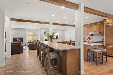 This expansive four-bedroom Country Club Townhome awaits your on The Snowmass Club in Colorado - for sale on GolfHomes.com, golf home, golf lot