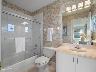 Discover a rare opportunity to own a custom-renovated luxury on New Smyrna Beach Golf Course in Florida - for sale on GolfHomes.com, golf home, golf lot