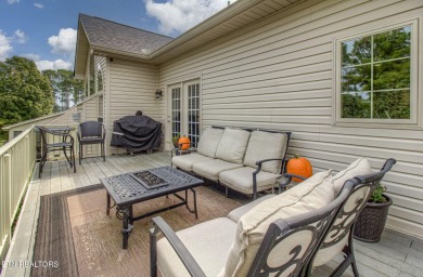 Nestled in the sought-after Tanasi Coves neighborhood of Tellico on Tanasi Golf Course in Tennessee - for sale on GolfHomes.com, golf home, golf lot