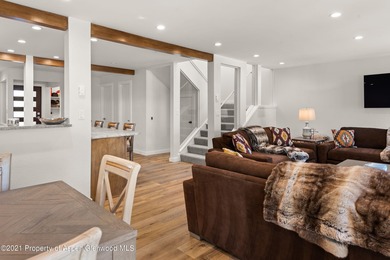 This expansive four-bedroom Country Club Townhome awaits your on The Snowmass Club in Colorado - for sale on GolfHomes.com, golf home, golf lot