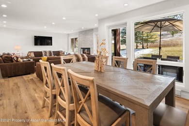 This expansive four-bedroom Country Club Townhome awaits your on The Snowmass Club in Colorado - for sale on GolfHomes.com, golf home, golf lot