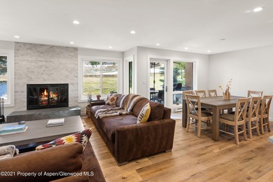 This expansive four-bedroom Country Club Townhome awaits your on The Snowmass Club in Colorado - for sale on GolfHomes.com, golf home, golf lot