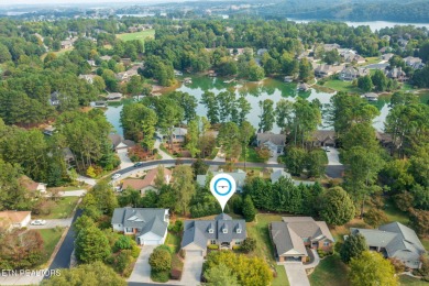 Nestled in the sought-after Tanasi Coves neighborhood of Tellico on Tanasi Golf Course in Tennessee - for sale on GolfHomes.com, golf home, golf lot