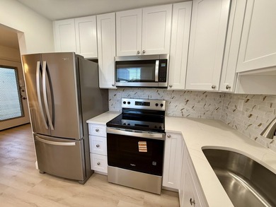 Updated 2BR/2BA condo located in the beautiful Kings Point Golf on Kings Point Golf -Flanders Way in Florida - for sale on GolfHomes.com, golf home, golf lot