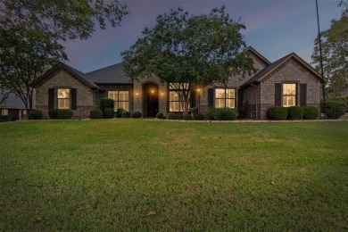 Welcome to this stunning brick and stone home located in the on Pecan Plantation Country Club in Texas - for sale on GolfHomes.com, golf home, golf lot