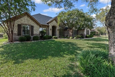 Welcome to this stunning brick and stone home located in the on Pecan Plantation Country Club in Texas - for sale on GolfHomes.com, golf home, golf lot