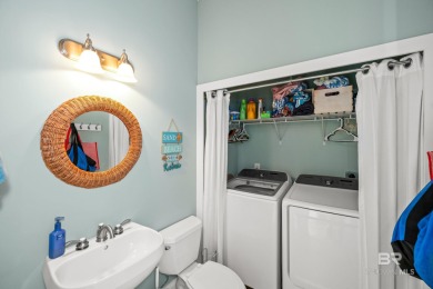 Experience refined coastal living in this beautiful two-story on Kiva Dunes Golf Club in Alabama - for sale on GolfHomes.com, golf home, golf lot