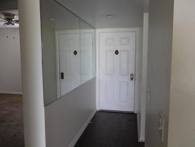 UPDATED 3RDFLOOR END UNIT WITH COURTYARD AND PARTIAL GOLF VIEWS on Bear Lakes Country Club in Florida - for sale on GolfHomes.com, golf home, golf lot