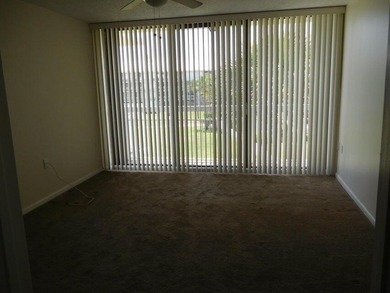 UPDATED 3RDFLOOR END UNIT WITH COURTYARD AND PARTIAL GOLF VIEWS on Bear Lakes Country Club in Florida - for sale on GolfHomes.com, golf home, golf lot