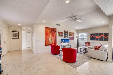 Welcome home to this delightful, bright and updated home in on Old Marsh Golf Club in Florida - for sale on GolfHomes.com, golf home, golf lot