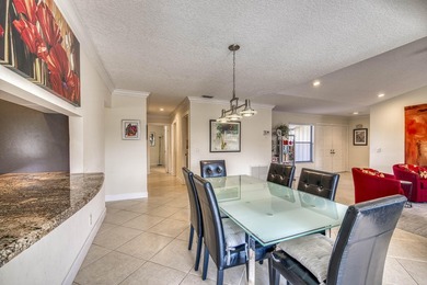 Welcome home to this delightful, bright and updated home in on Old Marsh Golf Club in Florida - for sale on GolfHomes.com, golf home, golf lot