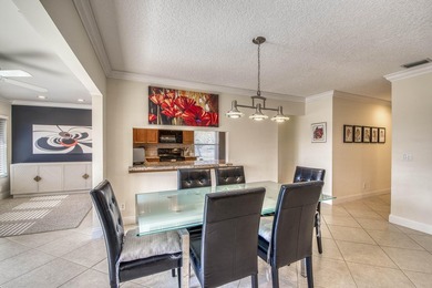 Welcome home to this delightful, bright and updated home in on Old Marsh Golf Club in Florida - for sale on GolfHomes.com, golf home, golf lot