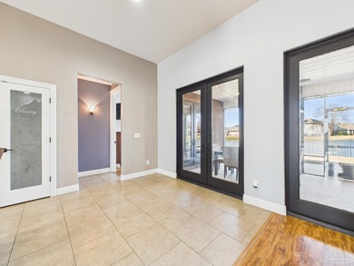 Welcome to this Custom-built lakefront residence offering on Stonebrook Golf Club in Florida - for sale on GolfHomes.com, golf home, golf lot