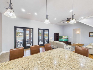 Welcome to this Custom-built lakefront residence offering on Stonebrook Golf Club in Florida - for sale on GolfHomes.com, golf home, golf lot