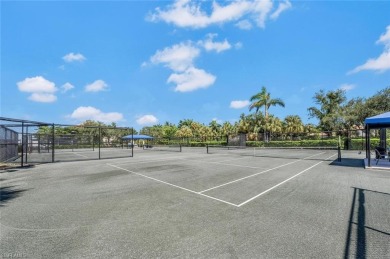 Welcome Home to Marina Cove, a charming, lushly landscaped on Windstar on Naples Bay in Florida - for sale on GolfHomes.com, golf home, golf lot