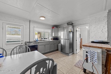 This 2nd row home on Oak Island that is known to the locals as on Founders Club At St. James Plantation in North Carolina - for sale on GolfHomes.com, golf home, golf lot
