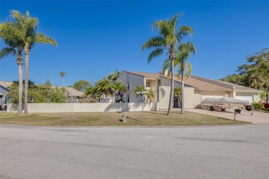 Welcome to this inviting waterfront community, where a tropical on Gulf Harbors Golf Course in Florida - for sale on GolfHomes.com, golf home, golf lot