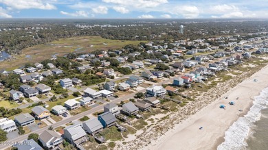 This 2nd row home on Oak Island that is known to the locals as on Founders Club At St. James Plantation in North Carolina - for sale on GolfHomes.com, golf home, golf lot