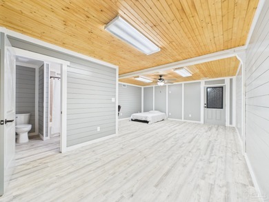 Welcome to this Custom-built lakefront residence offering on Stonebrook Golf Club in Florida - for sale on GolfHomes.com, golf home, golf lot