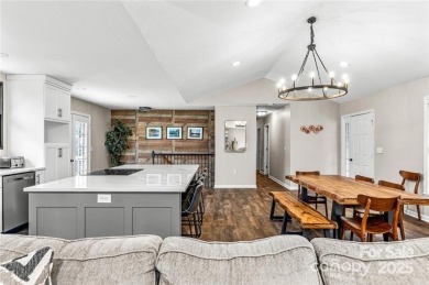 This beautifully updated turn-key furnished home is located on Rumbling Bald Resort on Lake Lure in North Carolina - for sale on GolfHomes.com, golf home, golf lot