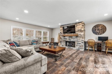 This beautifully updated turn-key furnished home is located on Rumbling Bald Resort on Lake Lure in North Carolina - for sale on GolfHomes.com, golf home, golf lot