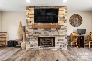This beautifully updated turn-key furnished home is located on Rumbling Bald Resort on Lake Lure in North Carolina - for sale on GolfHomes.com, golf home, golf lot