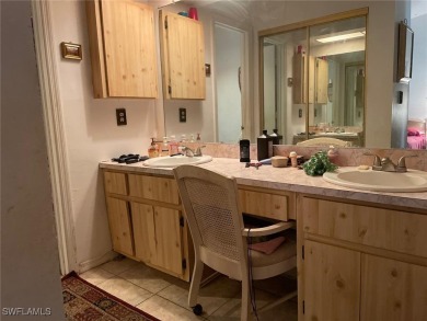 Opportunity Knocks! This 2BR/2BA single-story home in San Carlos on San Carlos Golf Club in Florida - for sale on GolfHomes.com, golf home, golf lot