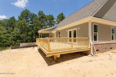 Newly completed construction situated on 1.14 acres in 7 Lakes on Beacon Ridge Golf and Country Club in North Carolina - for sale on GolfHomes.com, golf home, golf lot