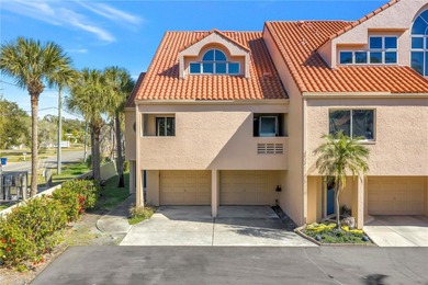 You don't want to miss this beautiful three-story townhouse on Pasadena Yacht and Country Club in Florida - for sale on GolfHomes.com, golf home, golf lot