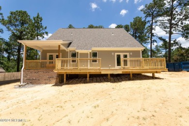 Newly completed construction situated on 1.14 acres in 7 Lakes on Beacon Ridge Golf and Country Club in North Carolina - for sale on GolfHomes.com, golf home, golf lot